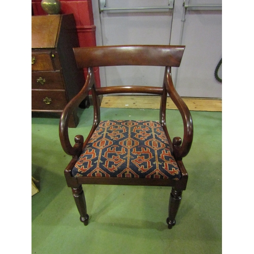 4201 - A Circa 1840 mahogany scroll arm elbow chair with bar back rest over turned and chamfered tapering f... 