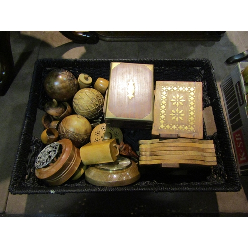 4237 - A basket containing a selection of treen including wooden boxes, barometer etc