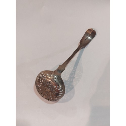 4364 - A Victorian Exeter silver sifter spoon, with engraved crest to handle, 1851, Johnstone, approx. 15cm