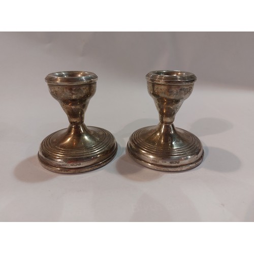 4367 - A pair of silver squat form candlesticks, 6.5cm tall, marked Birmingham