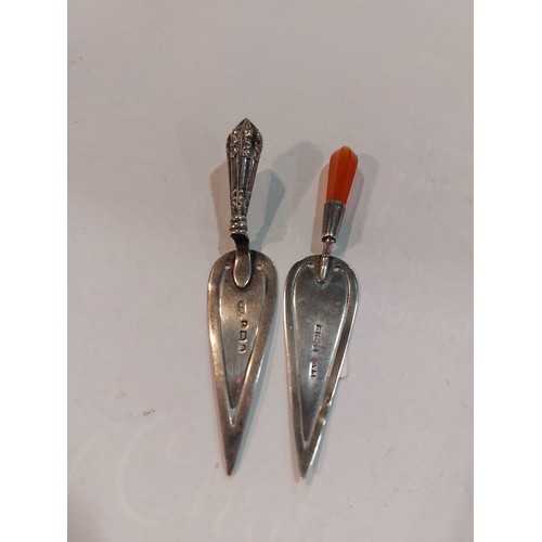 4396 - Two silver trowel form bookmarks, one with agate handle