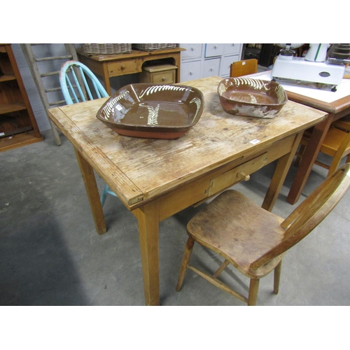 2244 - A country pine extending kitchen table with under drawer