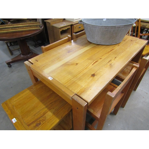 2253 - A modern pine table and four chairs