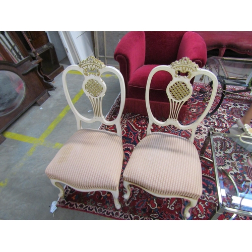 2269 - A pair of cream and gold painted French bedroom chairs