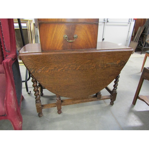 2274 - An oak barley twist gateleg table