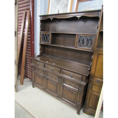 2294 - An Old Charm style oak full height dresser with plate rack top over three drawer, three door cupboar... 