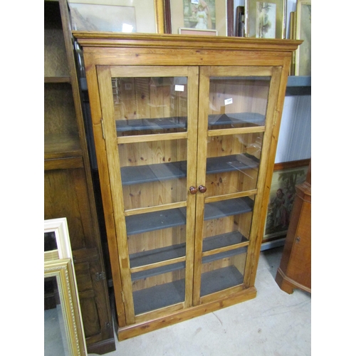 2297 - A country pine full height glazed bookcase