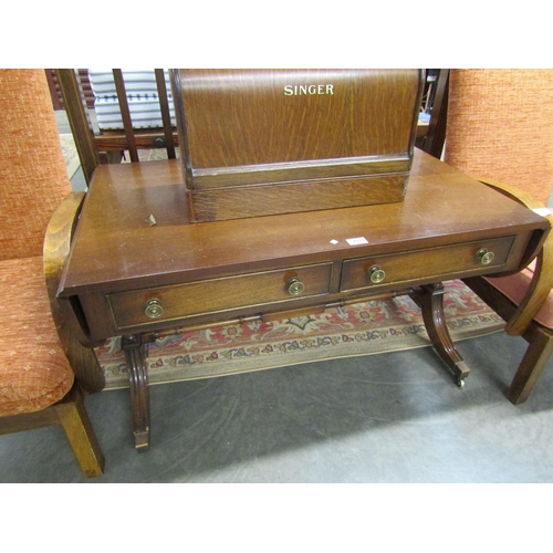 2323 - A reproduction mahogany two drawer coffee table