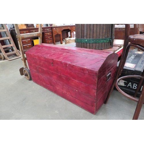 2014 - A red painted pine dome top chest     (E) £30-40