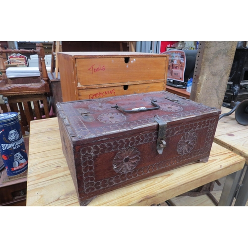 2035 - A heavily carved hardwood and metal bound table top box     (R) £25