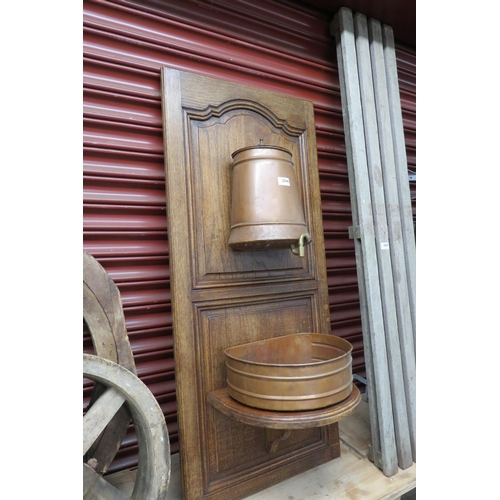 2046 - A French wall hanging copper wash bowl and tank on oak board