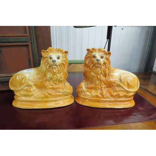 2059 - A pair of Staffordshire lions