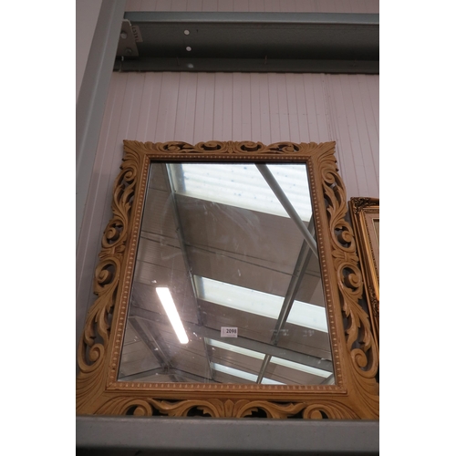 2098 - A carved and painted framed mirror 70 x 83cm