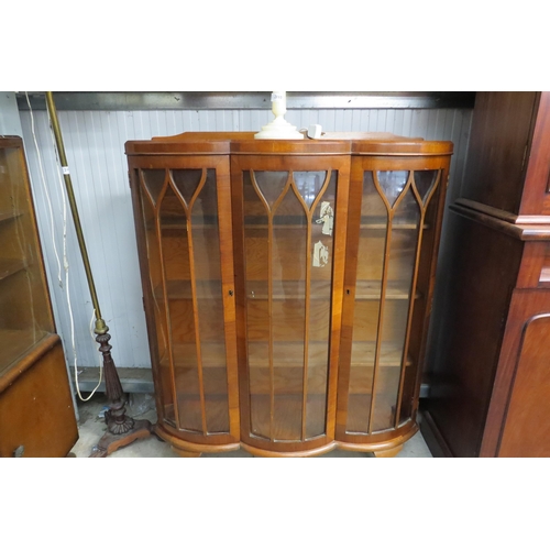 2111 - A 1930's walnut display cabinet with key taped to glass