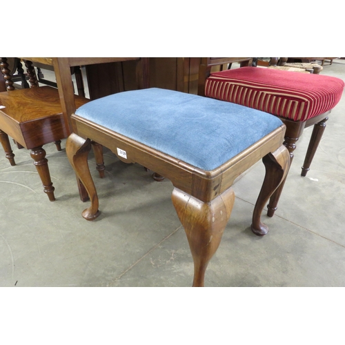 2129 - A 1930's walnut stool with a blue drop in seat