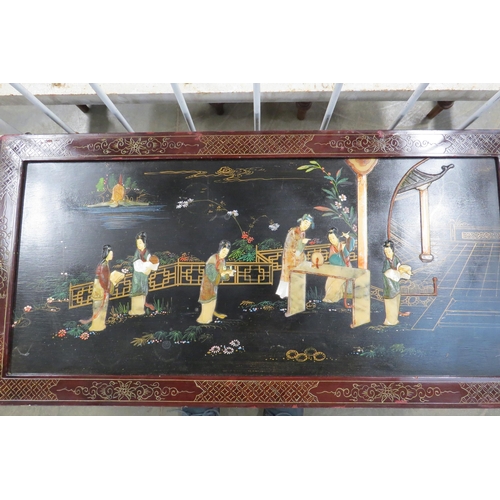 2142 - A Chinese carved glass top coffee table