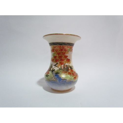 4273 - A 20th Century Oriental vase of waisted form, river landscape, gilt embellishment, 13cm tall