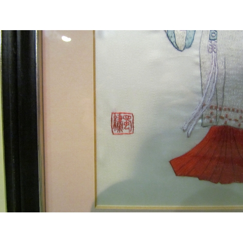 4277 - A near pair of Oriental silks, geisha girl, finch on branch, both framed and glazed, 23cm x 15cm