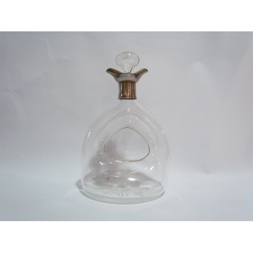 4291 - An Edwardian glass decanter, hole to centre, double-ended pourer with stopper, silver collar Birming... 