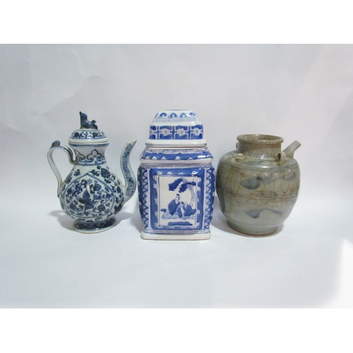 4308 - An Oriental square form blue and white tea canister, a teapot with scenes of birds amongst foliage a... 