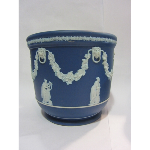 4439 - Three pieces of Wedgwood Jasperware, two jardinieres and jug