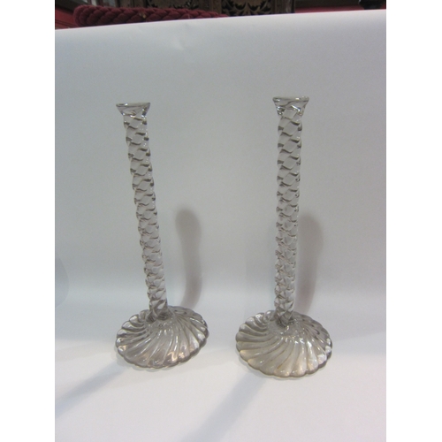 4441 - A pair of wrythen form glass stands with circular base, possibly milliners display stands, 38cm