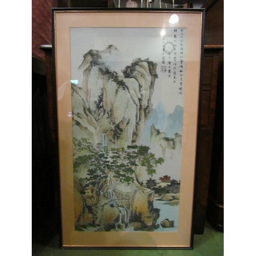 4222 - An Oriental silk picture, mountain, trees middle ground, figures on bridge by river, framed and glaz... 