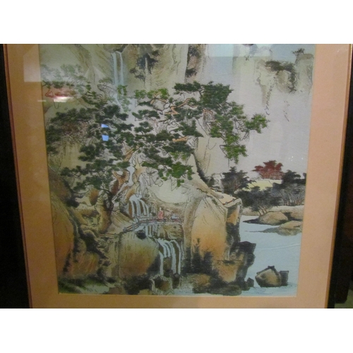 4222 - An Oriental silk picture, mountain, trees middle ground, figures on bridge by river, framed and glaz... 