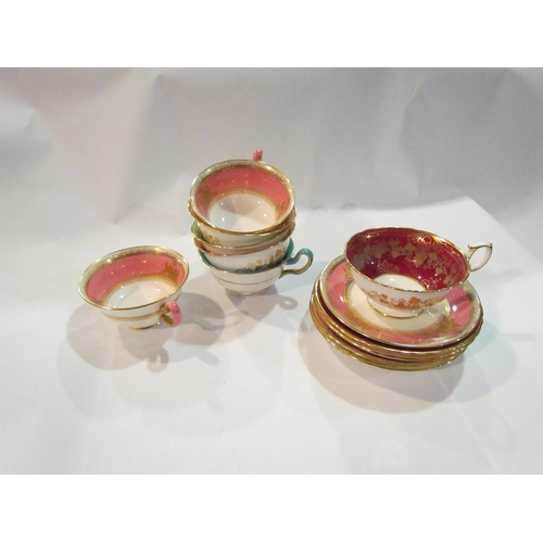 4345 - A selection of assorted Wedgwood cups and saucers, mostly pink and red with gilt embellishment