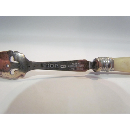 4399 - An unusual silver plated, mother-of-pearl handled orange peeler, registered design number 389455   (... 