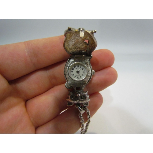 4400 - A silver pendant watch of cut form set with marcasite stones on chain pendant, approx. 38mm     (C)