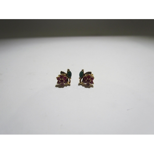 4412 - A pair of 9ct ruby and emerald set flower form earrings