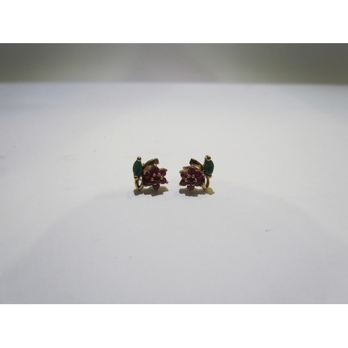 4412 - A pair of 9ct ruby and emerald set flower form earrings