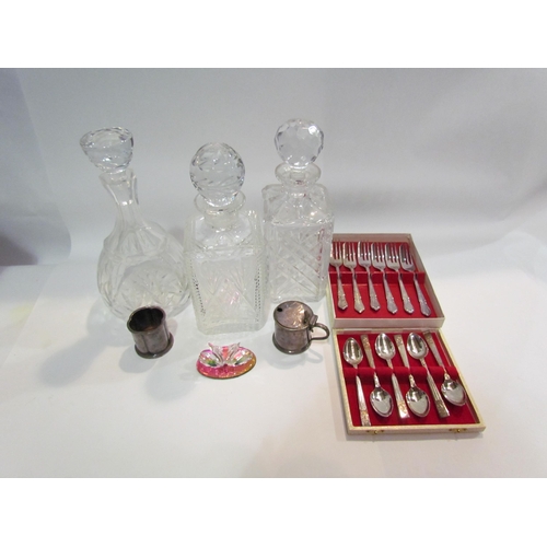 4473 - A selection of cut glass decanters and plated cake forks, teaspoons etc.