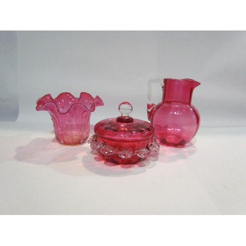 4495 - A cranberry jug with clear handle, a cranberry powder bowl with prunted girdle and a cranberry bowl ... 