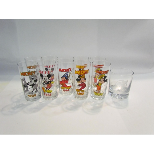 4498 - Nine Euro Disney Mickey Mouse drinking glasses and a tumbler