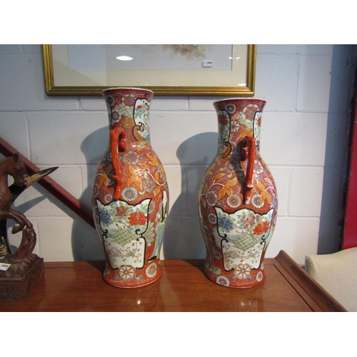 1002 - A near pair of Chinese famille rose twin handled vases of large proportions, a/f, both with damage/r... 