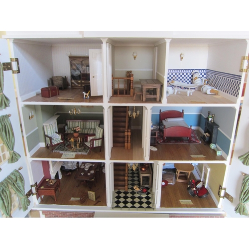 1089 - 'Montgomery Hall'- A large kit built dolls house by The Dolls House Emporium in the form of a three ... 