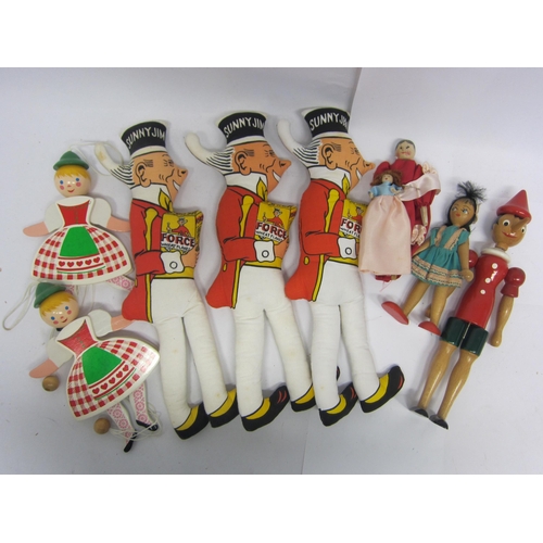 1248 - Three Force Wheat Flakes 'Sunny Jim' soft filled cloth dolls and assorted painted wooden dolls (8)