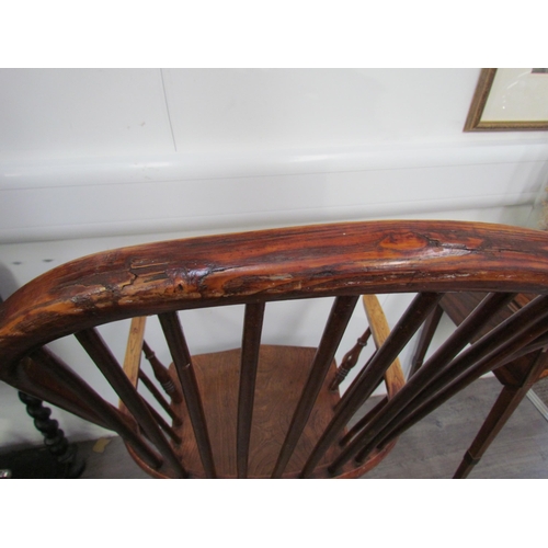 1103 - A pair of circa 1800 his and hers Windsor chairs, the hoop and stick-back over a solid elm seat, on ... 