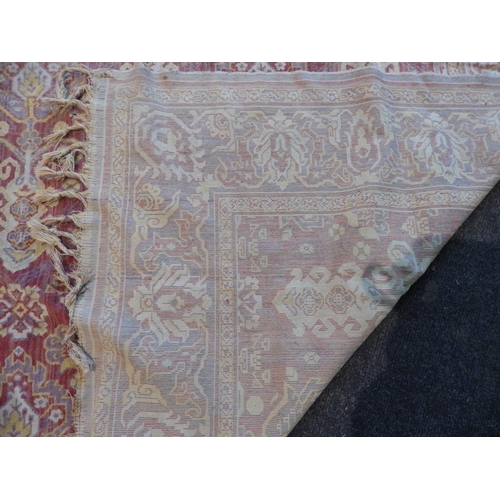 1152 - An Eastern rug, terracotta ground, central panels, multiple borders, tasselled ends, a/f, 184cm x 12... 