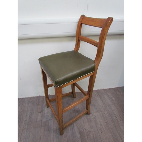 1137 - A circa 1900 shipping clerk’s desk, spindle gallery back, green tooled leather sloped surface with l... 