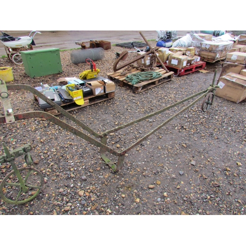 3236 - A cast iron drag harrow frame with wheel