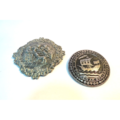 1273 - An embossed brooch and a ship brooch (C)