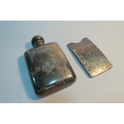 1321 - A W&G Neal silver hip flask, ergonomic form, initialled to front, London 1910, together with an ergo... 