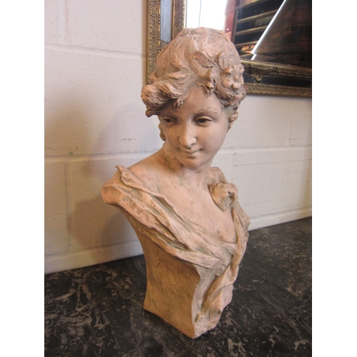 1011 - A modern sculptural bust of female, 50cm tall