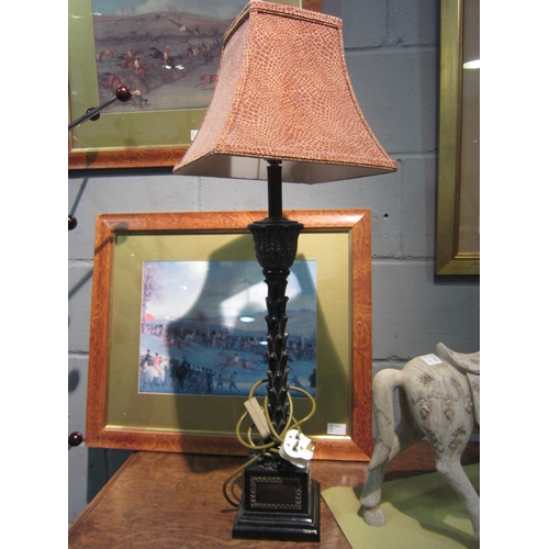 1040 - A pair of bronzed design table lamp bases with animal print style shade