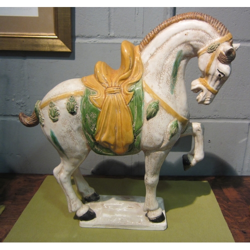 1041 - A ceramic tang style rearing horse figure, 46.5cm tall