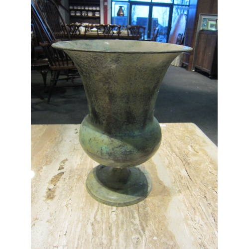 1092 - A modern verdigris metal urn form planter, 39cm