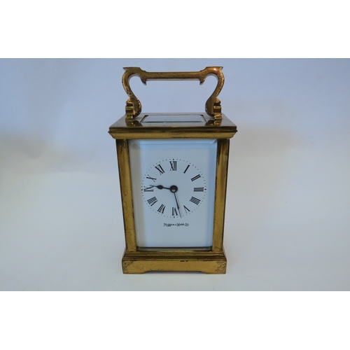 1355 - A Mappin & Webb brass carriage clock, door glass cracked   (C)